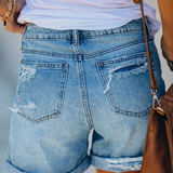Shorts en denim pour femmes avec ourlets retroussés