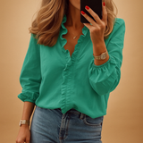 Blouse pour femmes avec décolleté en V et plis